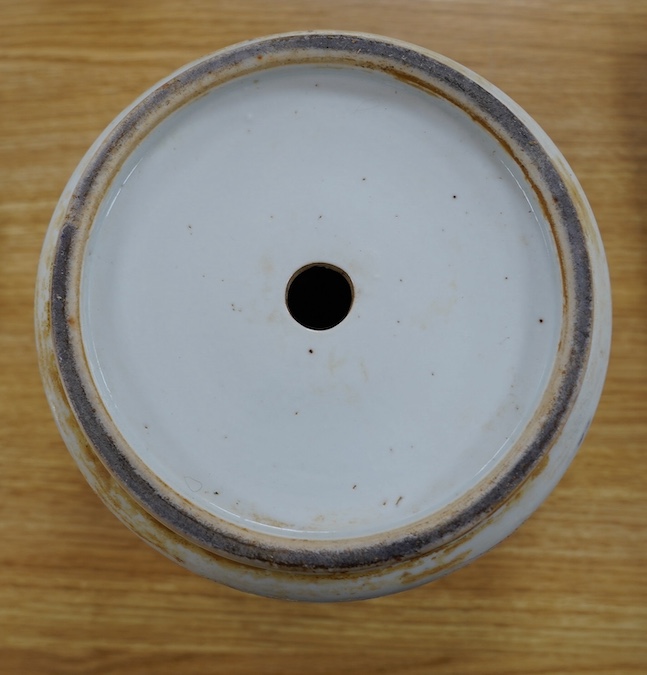 A 19th century Chinese famille rose flower pot, 19.5cm high. Condition - hole drilled to base.